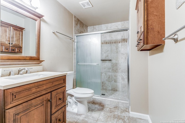 bathroom featuring walk in shower, vanity, and toilet