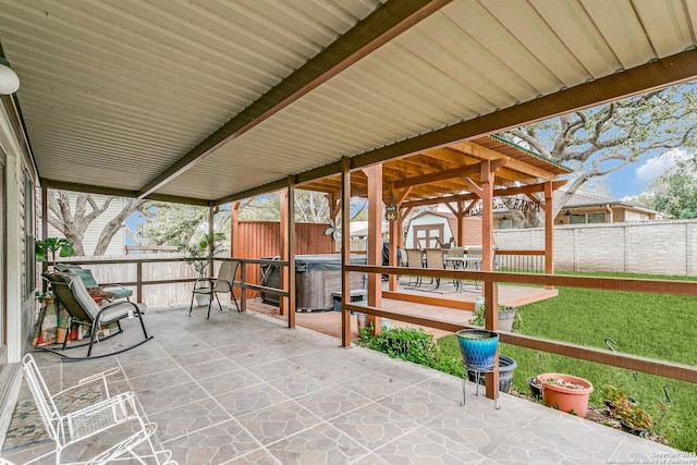 view of patio featuring a hot tub