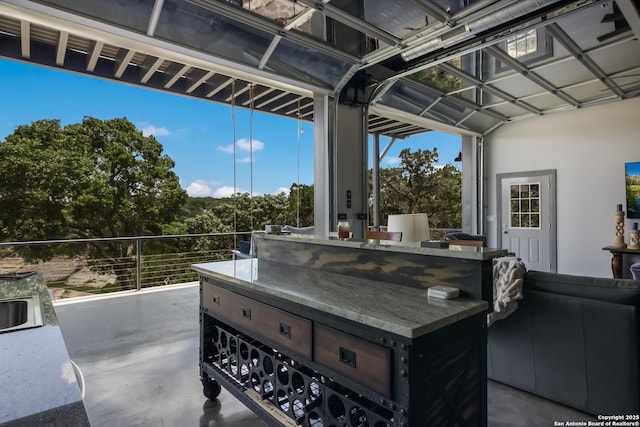 view of patio with exterior kitchen