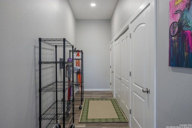 hall with dark hardwood / wood-style floors