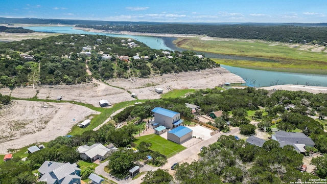 drone / aerial view featuring a water view