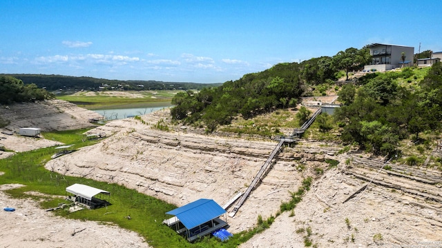 surrounding community featuring a water view