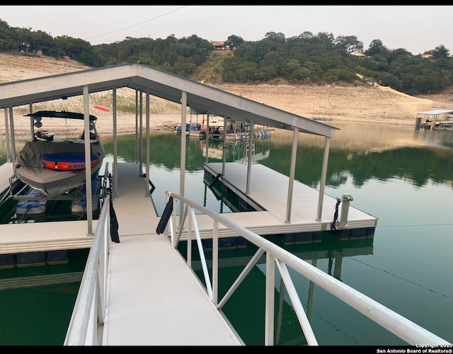 view of dock with a water view