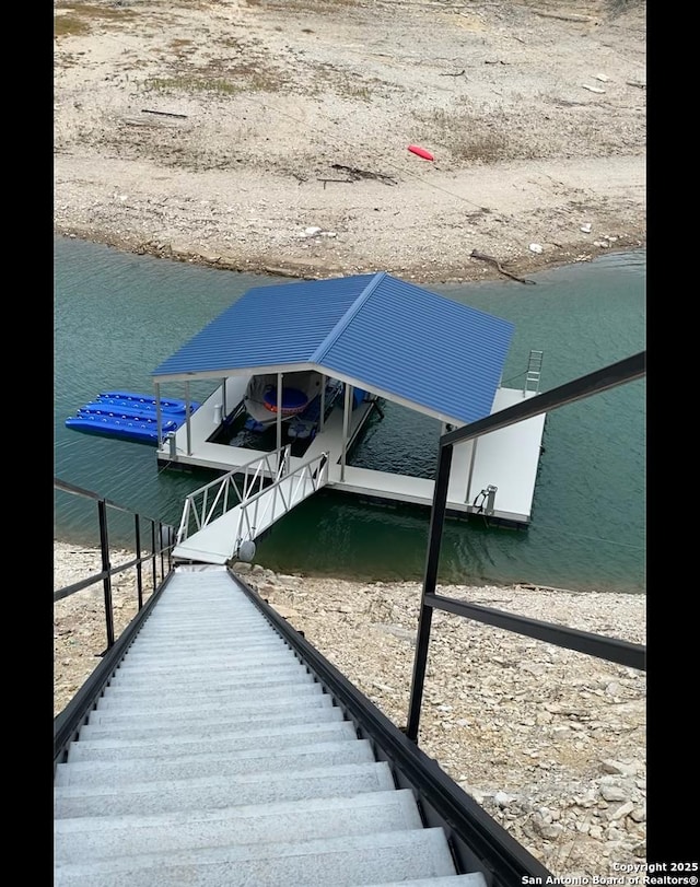 view of dock featuring a water view