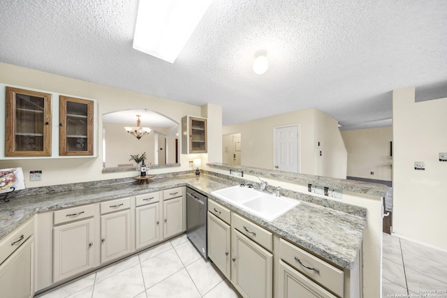 kitchen featuring light tile patterned floors, kitchen peninsula, dishwasher, a textured ceiling, and sink