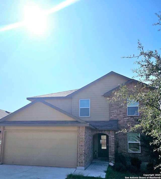 view of front of home with a garage