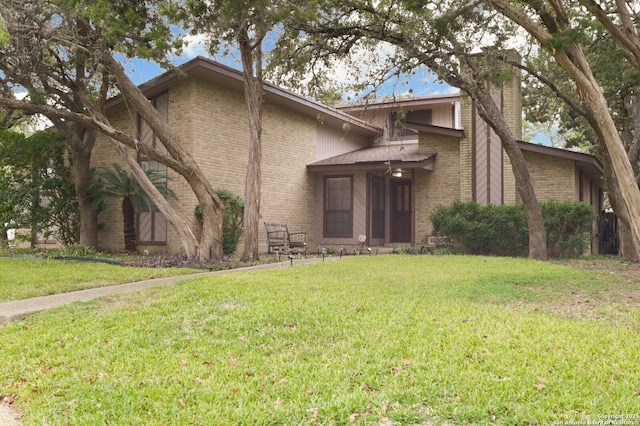 view of front facade with a front lawn