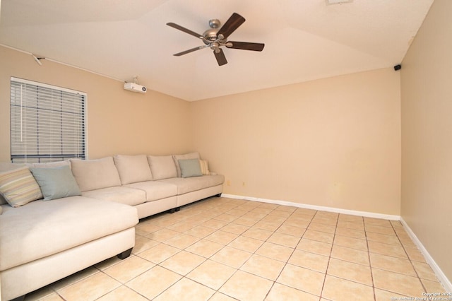 tiled living room featuring vaulted ceiling and ceiling fan