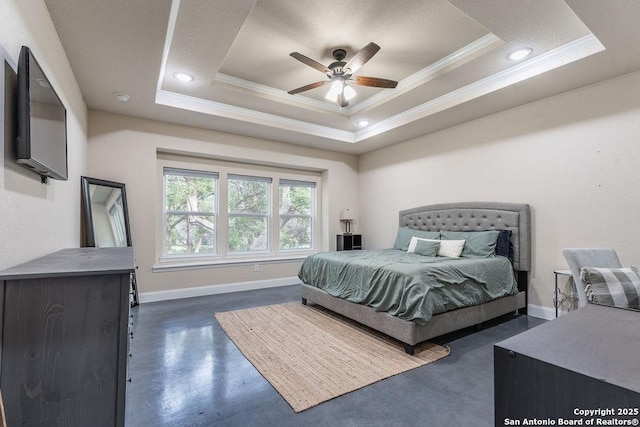 bedroom featuring ceiling fan, ornamental molding, and a raised ceiling