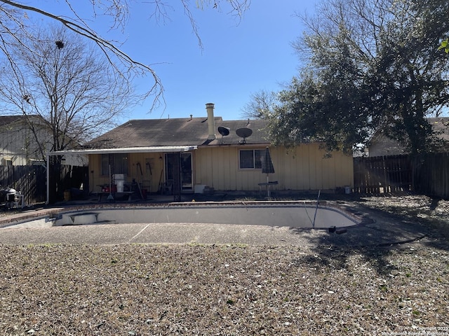 rear view of house with a patio area