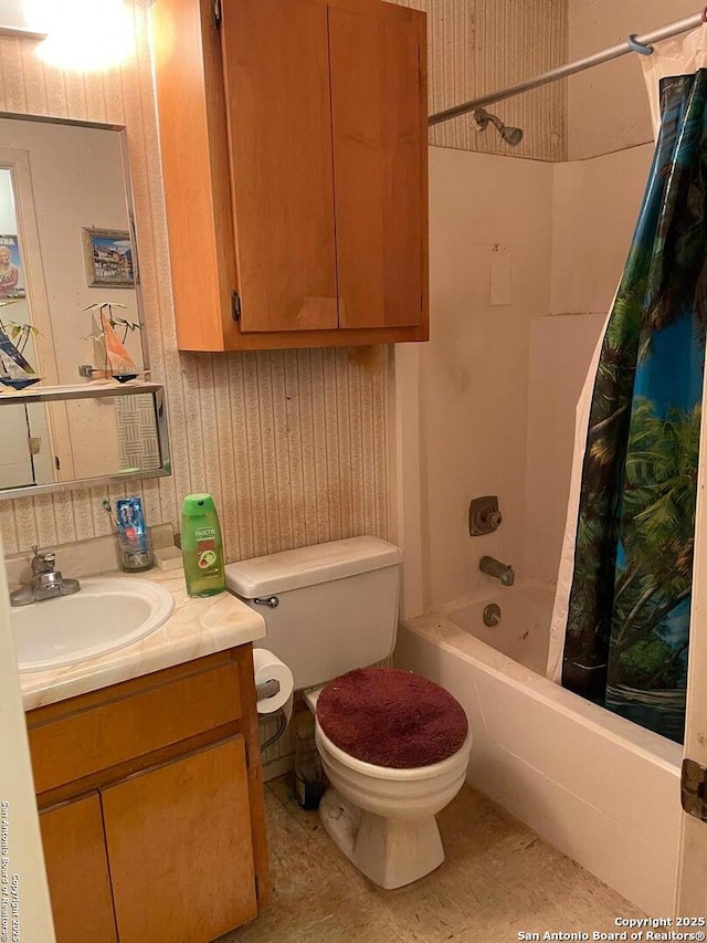 full bathroom with toilet, shower / tub combo, and vanity