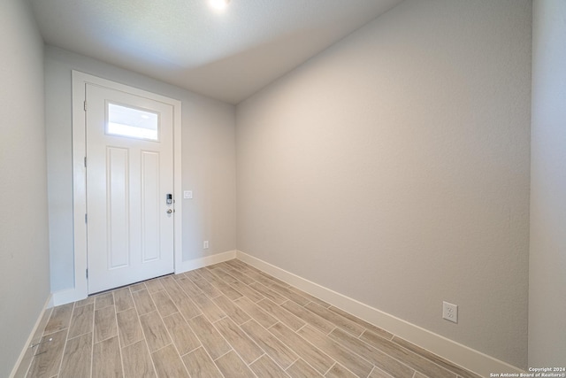 foyer entrance with light hardwood / wood-style floors