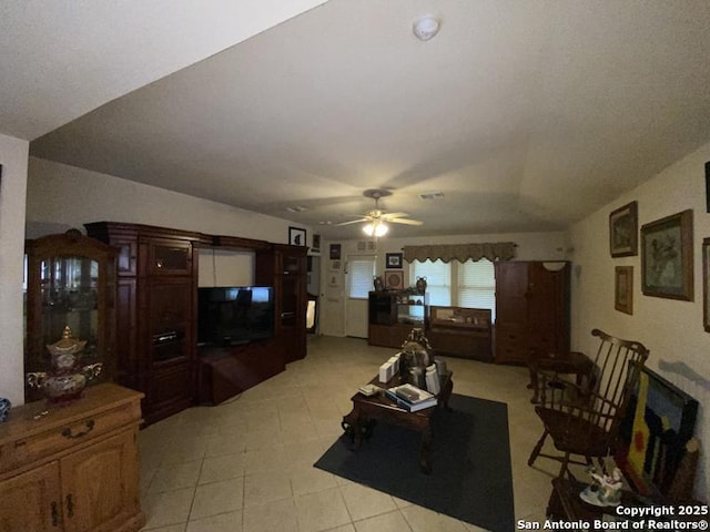 living room featuring ceiling fan