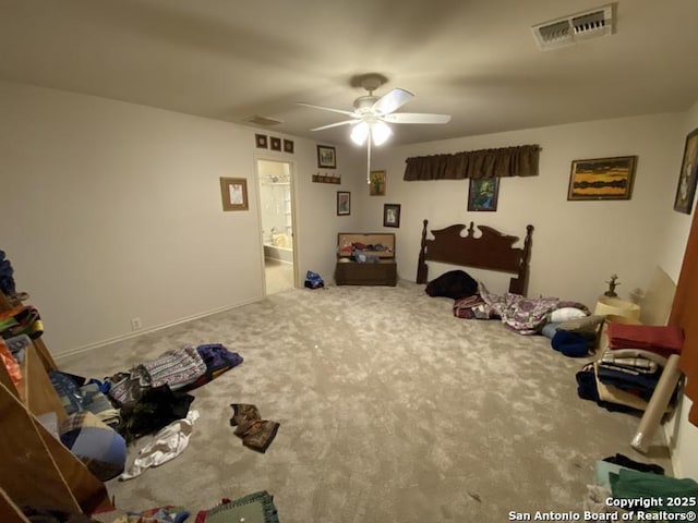 carpeted bedroom featuring ceiling fan and connected bathroom