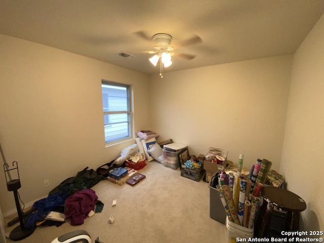 rec room featuring carpet floors and ceiling fan