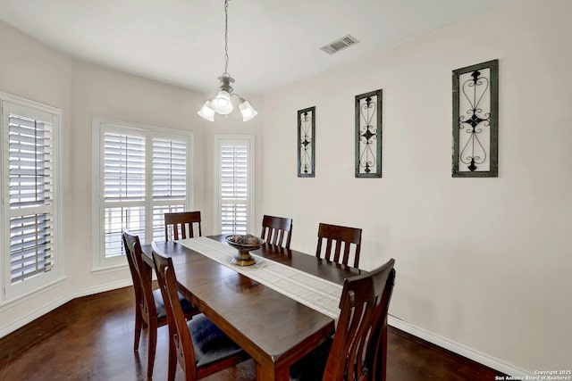 dining room with an inviting chandelier