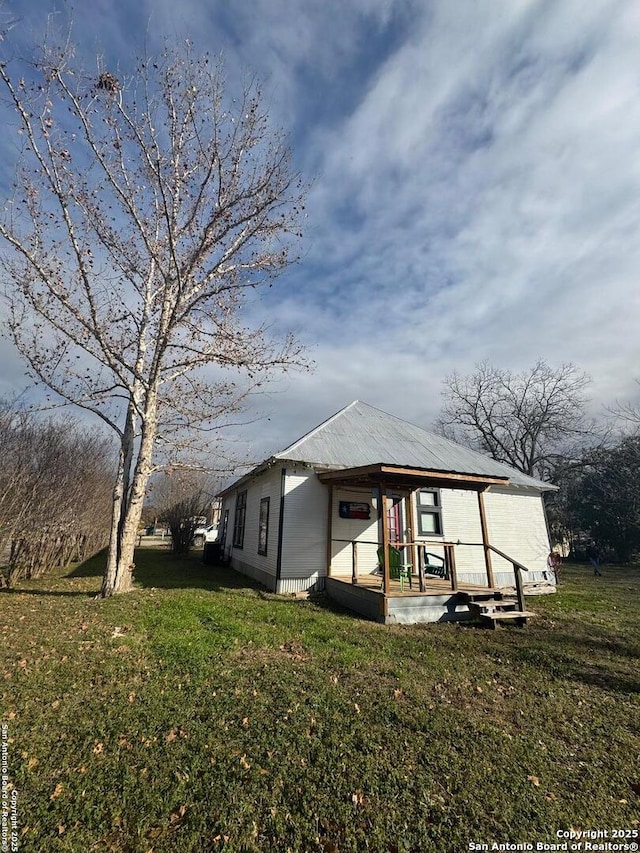 exterior space with a yard