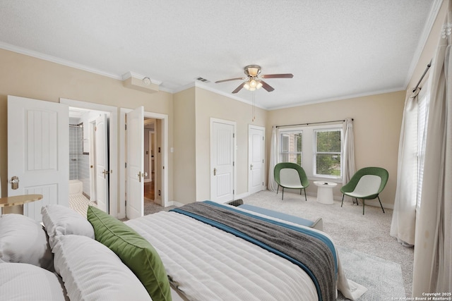 bedroom featuring carpet flooring, crown molding, visible vents, and baseboards