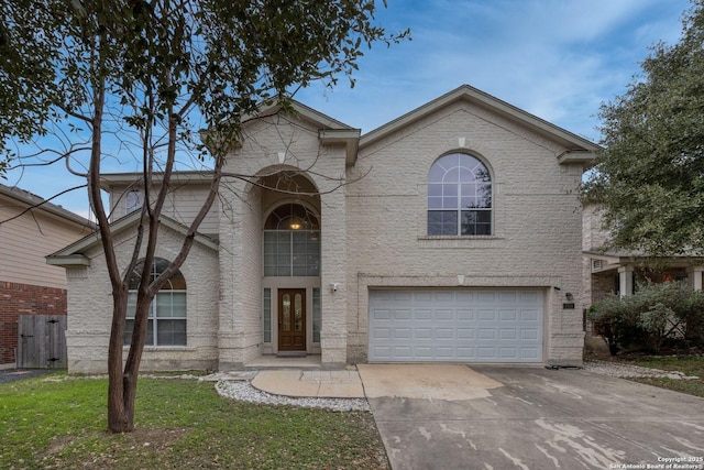 view of front of property with a garage