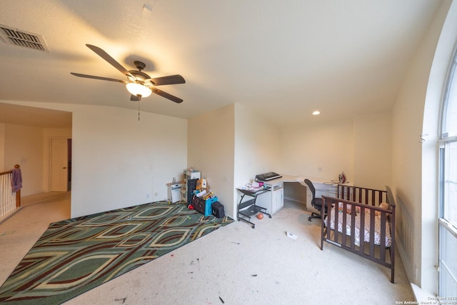 carpeted bedroom featuring ceiling fan and lofted ceiling