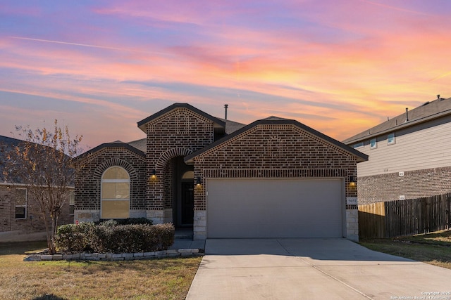 view of front of property featuring a garage