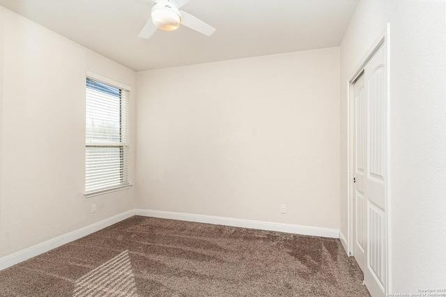 unfurnished bedroom with ceiling fan, a closet, and carpet floors