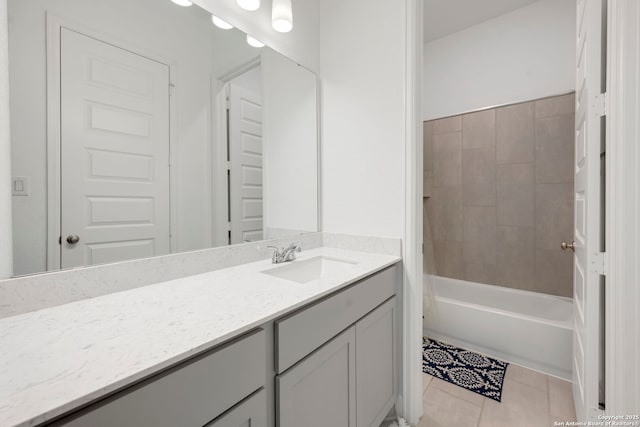 bathroom with tile patterned flooring, vanity, and shower / bath combo with shower curtain