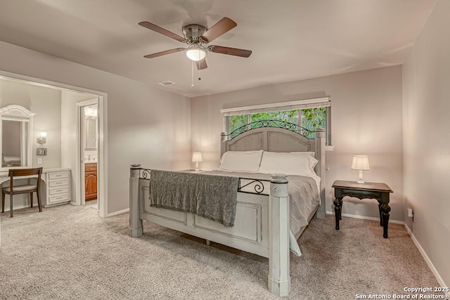 carpeted bedroom featuring ceiling fan and connected bathroom