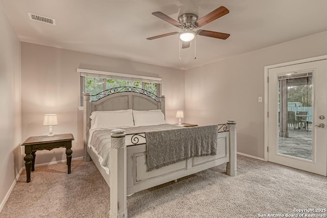 bedroom with ceiling fan, multiple windows, light carpet, and access to outside