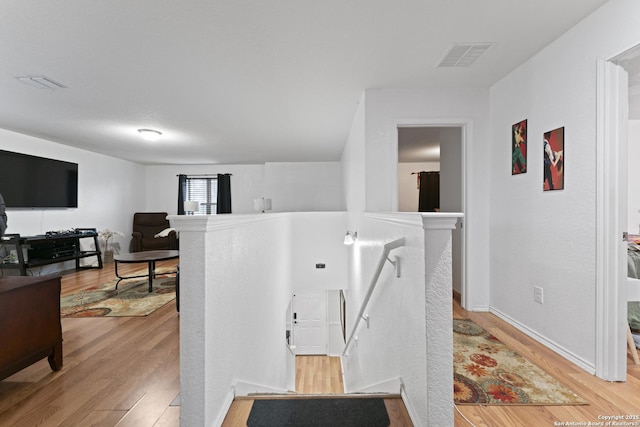 hall featuring light wood-type flooring