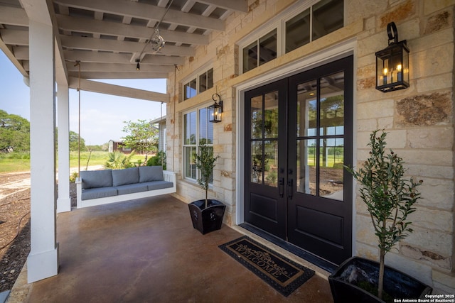 view of exterior entry with french doors