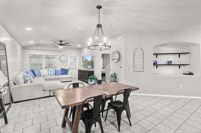 dining area with light tile patterned floors, vaulted ceiling, and ceiling fan with notable chandelier