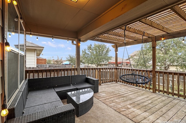 wooden terrace featuring an outdoor hangout area and a pergola