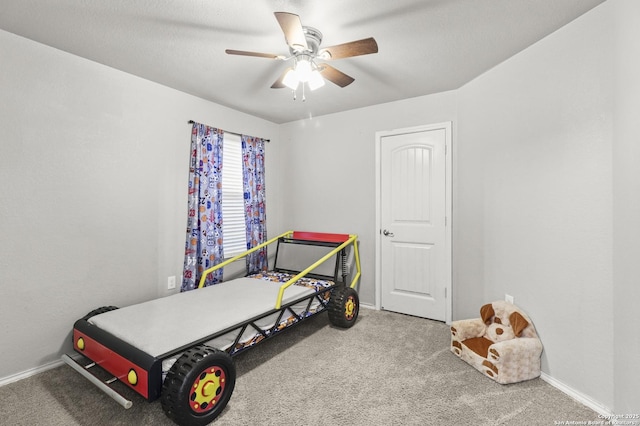 carpeted bedroom with ceiling fan