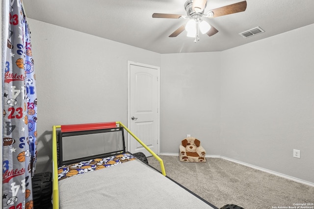 playroom featuring ceiling fan and carpet flooring