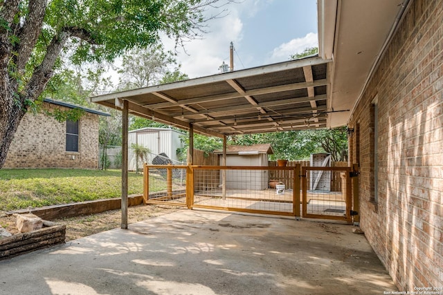 view of patio / terrace with a storage shed