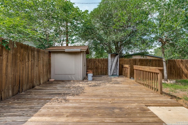 wooden deck with a storage unit