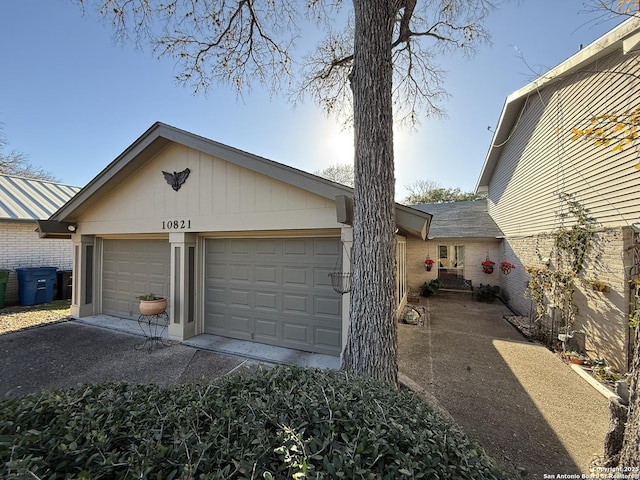 exterior space with a garage