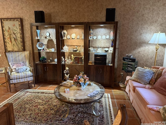 living room with light tile patterned floors and built in features