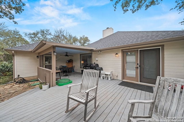 wooden terrace with ceiling fan