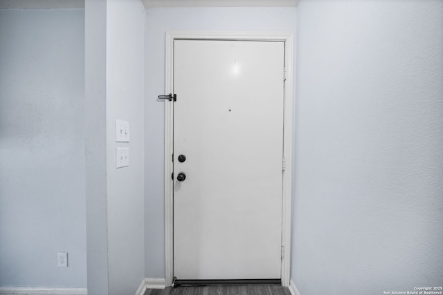 doorway featuring hardwood / wood-style floors