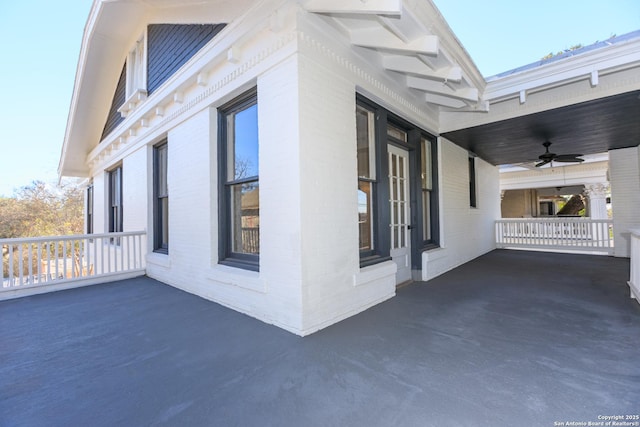 view of home's exterior with ceiling fan