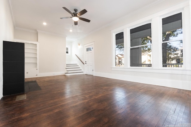 unfurnished living room with ceiling fan, dark hardwood / wood-style flooring, and crown molding