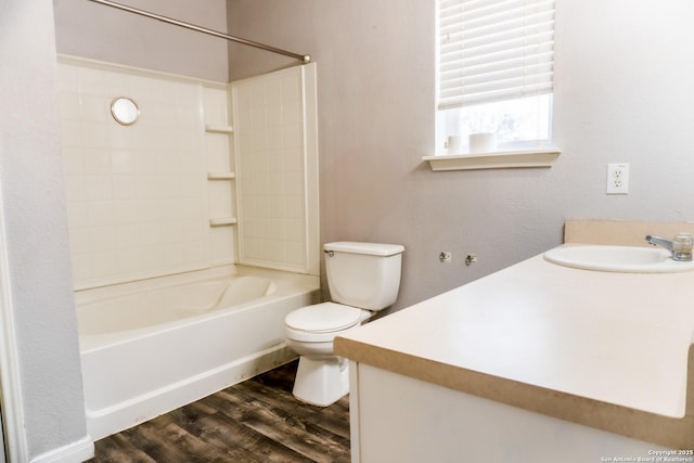 full bathroom with toilet, vanity, bathing tub / shower combination, and hardwood / wood-style flooring