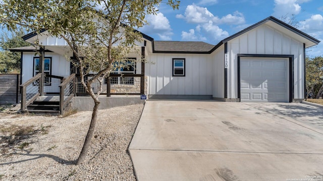 view of front of property with a garage