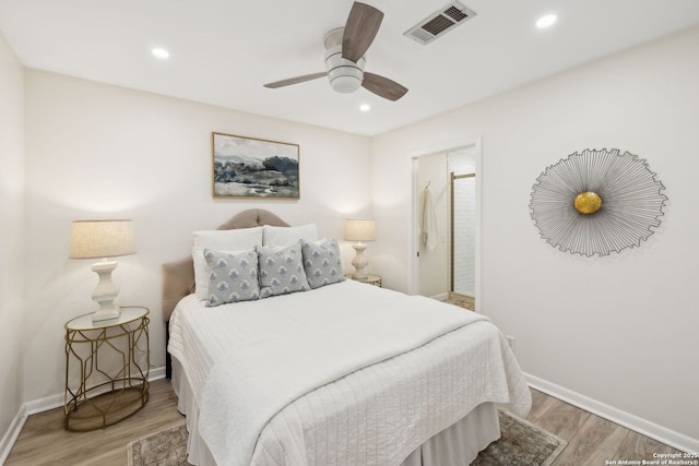 bedroom featuring ceiling fan and light hardwood / wood-style floors