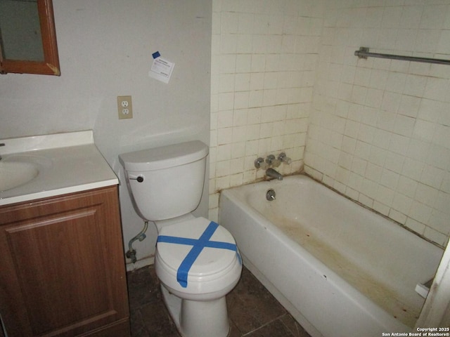 bathroom with toilet and vanity