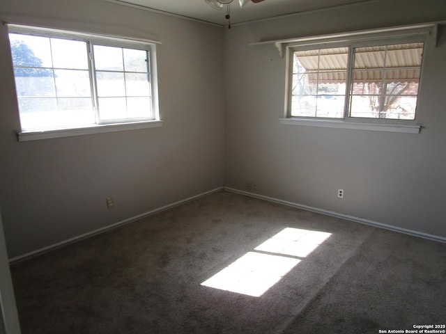 carpeted empty room with ceiling fan