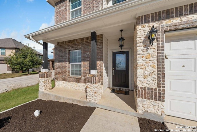 doorway to property featuring a porch