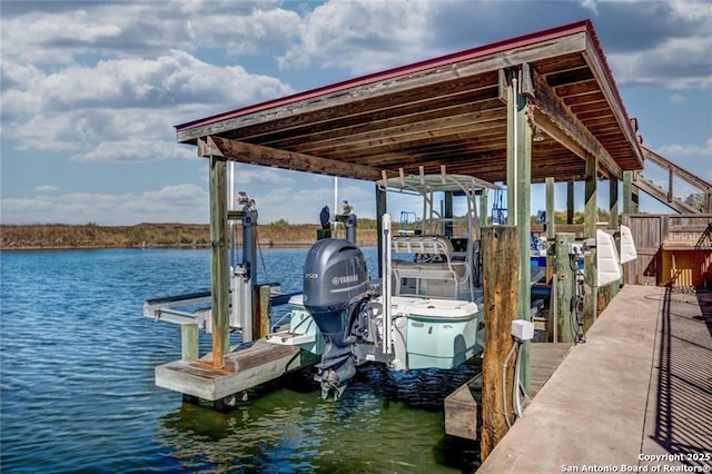 view of dock with a water view